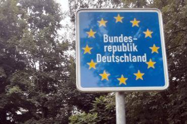 Sheepskins - Business meeting on the Belgian-German border.