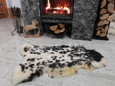 Sheepskins -  Sheepskins in front of the fireplace